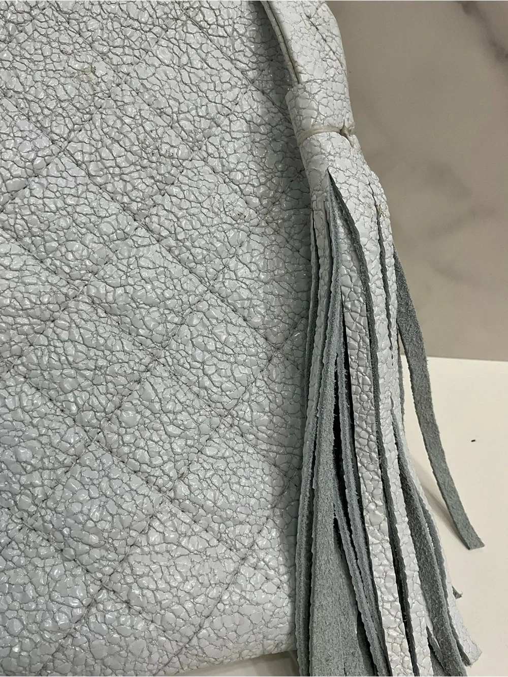 LAGGO Ice White Crackled Metallic Wristlet Clutch Tassel Pouch